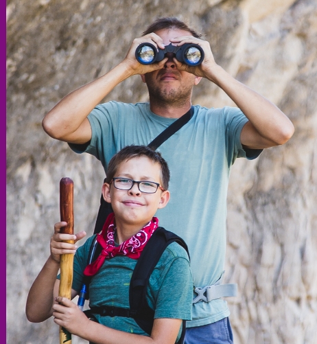 father and child on a hike
